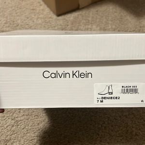 Brand new black Calvin Klein boots. From non-smoking home.